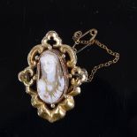 A 19th century relief carved banded agate hardstone cameo panel brooch, depicting bust of lady, in