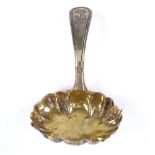 A George III silver-gilt caddy spoon, reeded handle with scalloped bowl, by Duncan Urquhart &
