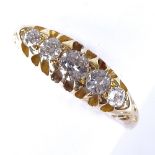 An early 20th century 18ct gold 5-stone graduated diamond half hoop ring, total diamond content