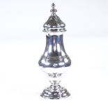 An Edwardian silver baluster sugar caster, reeded shaped body, by Charles Edwards, hallmarks