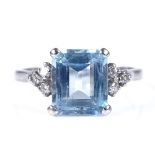 An 18ct white gold aquamarine and diamond dress ring, aquamarine length 8.7mm, size M, 3.4g Good