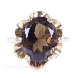 A late 20th century 9ct gold smoky quartz dress ring, hallmarks London 1989, setting height 16.