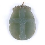 A relief carved jade crucifix pendant, pendant height 42.9mm, 12.8g Good original condition, no