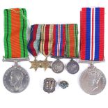 A group of 4 Second War miniature medals, a 39-45 Defence medal, and a 1939-45 medal, and 2 Scouting