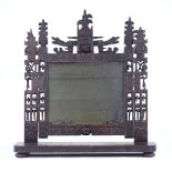 A rare 18th century Welsh Folk Art carved and pierced wood-framed toilet mirror, with dragon