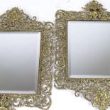 A pair of Victorian cast brass-framed wall mirrors, pierced and embossed acanthus decorated