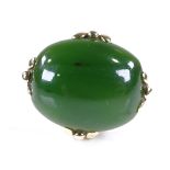 A late 20th century 9ct gold cabochon jade dress ring, setting height 17.5mm, size O/P, 9.2g Very