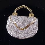 A modern 9ct gold diamond cluster purse pendant, total diamond content approx 0.5ct, pendant