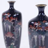 A fine quality pair of Japanese cloisonne enamel vases, with detailed plant designs, height 18cm
