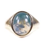 A late 20th century 9ct gold cabochon moss agate signet ring, hallmarks Birmingham 1972, setting
