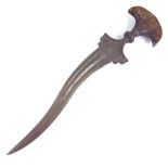 A Middle Eastern Kris dagger, 18th or 19th century, horn handle with floral engraved steel mount,