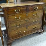 A George III mahogany chest of 3 long and 2 short drawers, with blind fret carved corners, and