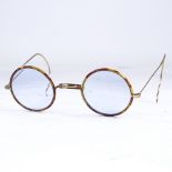 A pair of Vintage tortoiseshell and unmarked yellow metal spectacles