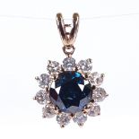 A 14ct rose gold fancy dark blue and colourless diamond cluster pendant, central stone approx 1.1ct,