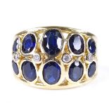 A heavy late 20th century 18ct gold sapphire and diamond bombe dress ring, setting height 13.9mm,