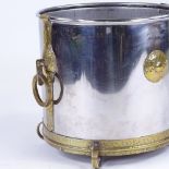 An Arts and Crafts white metal and brass-mounted wine cooler, with brass ring handles, circa 1900,