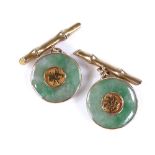 A pair of Chinese 14ct gold jade disc character mark panel cufflinks, panel diameter 16.4mm, 5g