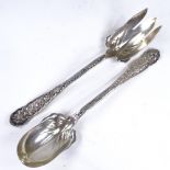 TIFFANY & CO - a pair of 19th century American sterling silver salad servers, relief floral