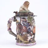 A Capodimonte porcelain tankard, relief moulded Classical battle scene decoration surmounted by a