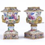 A pair of 19th century Chinese porcelain miniature urns, painted and gilded enamel scenes, height
