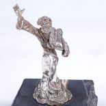 An Israeli sterling silver Moses with Ten Commandments statuette on carved marble plinth, by