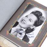 An album of film star postcards, most with original pen signatures, including John Mills, Margaret