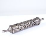 An Eastern unmarked white metal scroll holder, pierced and engraved floral decoration, overall