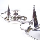 A pair of silver plated chamber sticks with candle snuffers, diameter 15.5cm Good original