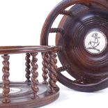 A pair of lignum vitae ship's decanter coasters, with delicate barley twist spindles and inset