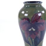 Moorcroft Pottery Orchid design vase, early 20th century, signed under base with impressed factory