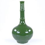 A Chinese green glaze porcelain narrow-necked vase