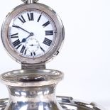 An early 20th century large silver-mounted Capstan inkwell, Goliath pocket watch inset lid with