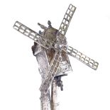 An Antique Continental unmarked silver windmill design wager cup part, realistically formed with