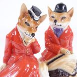 A pair of Cooper Craft Staffordshire China hunting foxes in red coats, height 19cm Perfect condition