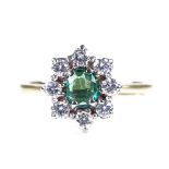 A late 20th century 18ct gold emerald and diamond cluster dress ring, setting height 10.4mm, size