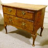 An 18th century walnut chest on stand, quarter veneered top on cabriole legs, width 102cm, height