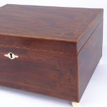 A Georgian banded mahogany sewing box, on ivory feet, with tray fitted interior, width 33cm Very