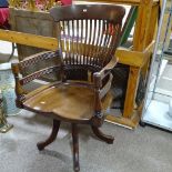 A late 19th century mahogany bow-arm office chair