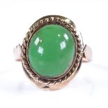 An 18ct rose gold cabochon green stone dress ring, setting height 16.5mm, size P, 3.5g Fair