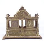 A good quality Victorian relief cast gilt-bronze letter rack, length 22cm