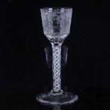 An 18th century cordial glass, with wheel-cut bowl and double helix milk twist stem, height 14.5cm