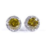 A pair of 14ct white gold 1.88ct fancy greyish yellow cluster earrings, with stud fittings, each