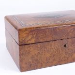 A 19th century French amboyna and tulipwood-banded jewel box, with inlaid brass and ivory
