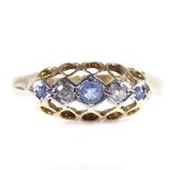 An early 20th century 18ct gold graduated 5-stone sapphire and diamond half hoop ring, palladium-