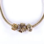 CHAMILIA - a modern 14ct gold snake link charm bracelet, and 3 Chamilia 14ct Swarovski Crystal