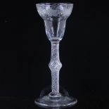 An 18th century cordial glass, with vine decorated wheel-cut bowl and multi-twist stem, height 15.