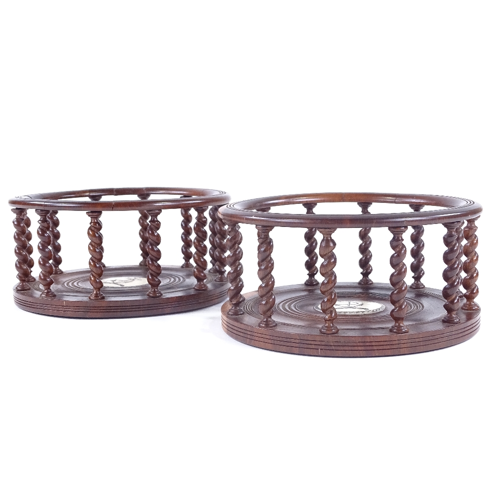 A pair of lignum vitae ship's decanter coasters, with delicate barley twist spindles and inset - Image 3 of 3