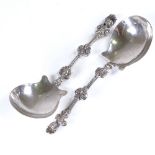 A pair of German Augsburg silver spoons, cast female bust terminals, pineapple mark on reverse of
