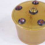 A 19th century Scottish horn box and cover, the lid inset with citrine and amethysts, diameter 8cm