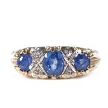 A modern 9ct gold 7-stone sapphire and diamond half hoop ring, engraved scrollwork settings, setting